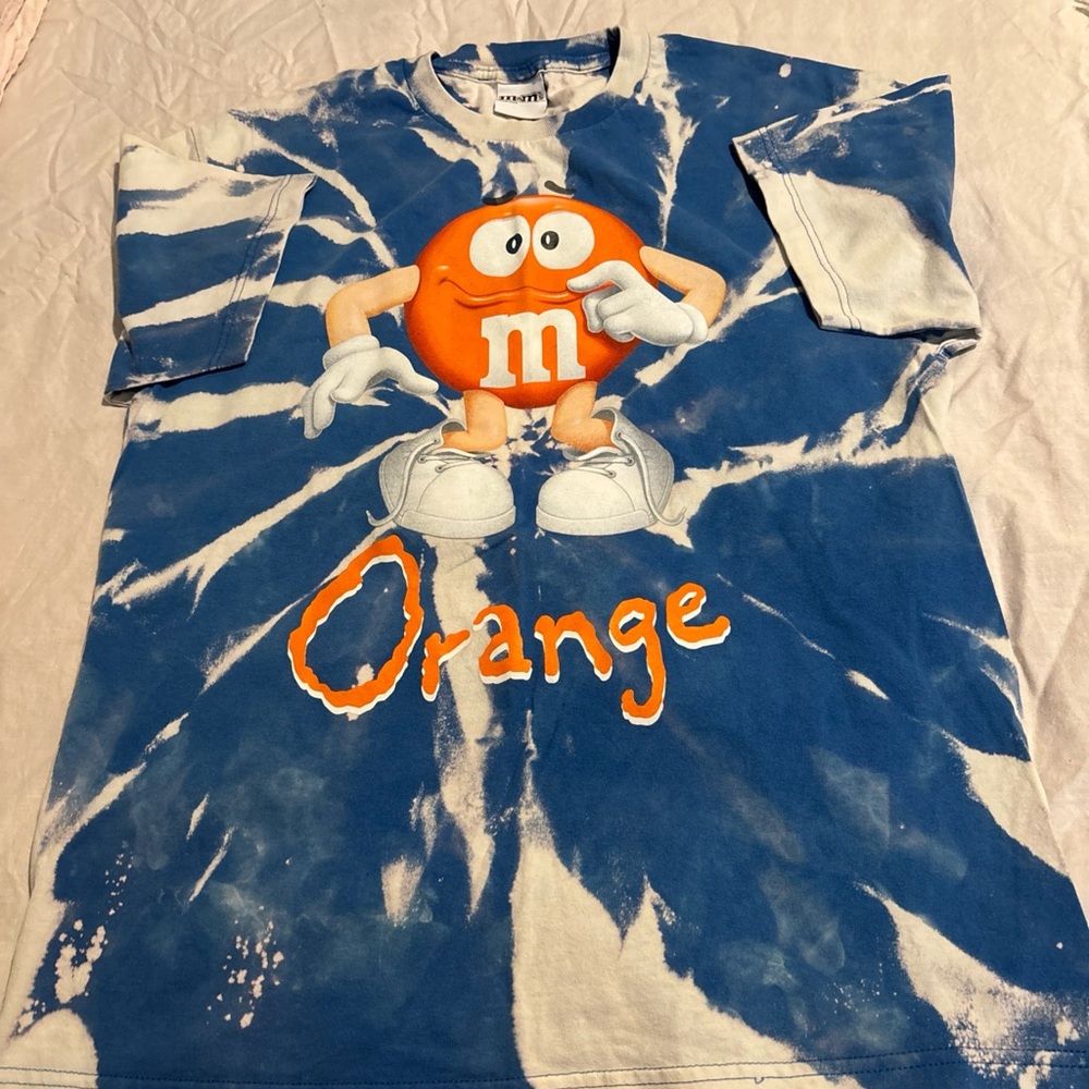 M&M'S Blue and White Tie-Dye T-Shirt
Orange M&M Character 
2011 Original Logo